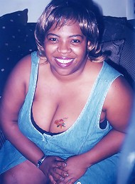 Sandra Is A Sexy Black Woman Who Likes To Get Wild On The Couch. Cum Watch Her Plop Out Those Big Natural Titties While Doing A Sexy Little Strip Teas